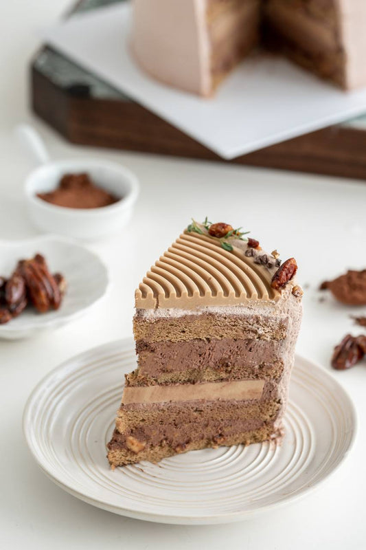 Slice of Coffee Pecan Valhorna Chocolate Cake