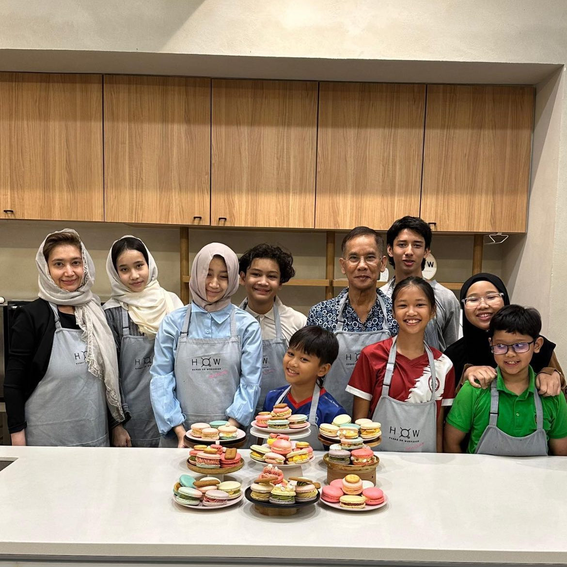 Family gathering celebration with people baking 'Fatcatons' 