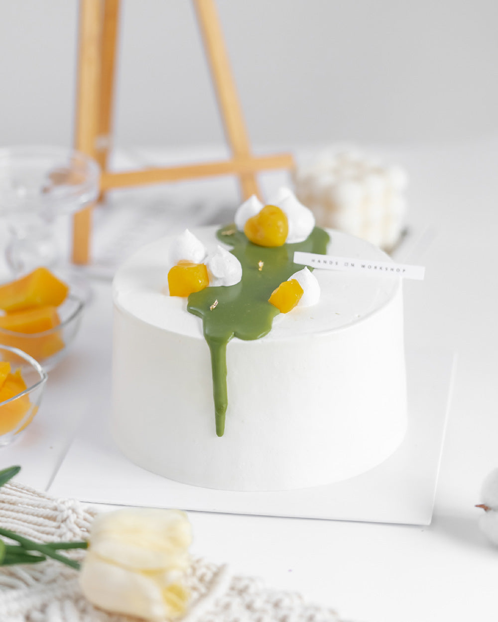 Minimalist cake design of the Mong Cha Cha Matcha Mango Cake by Hands On Workshop