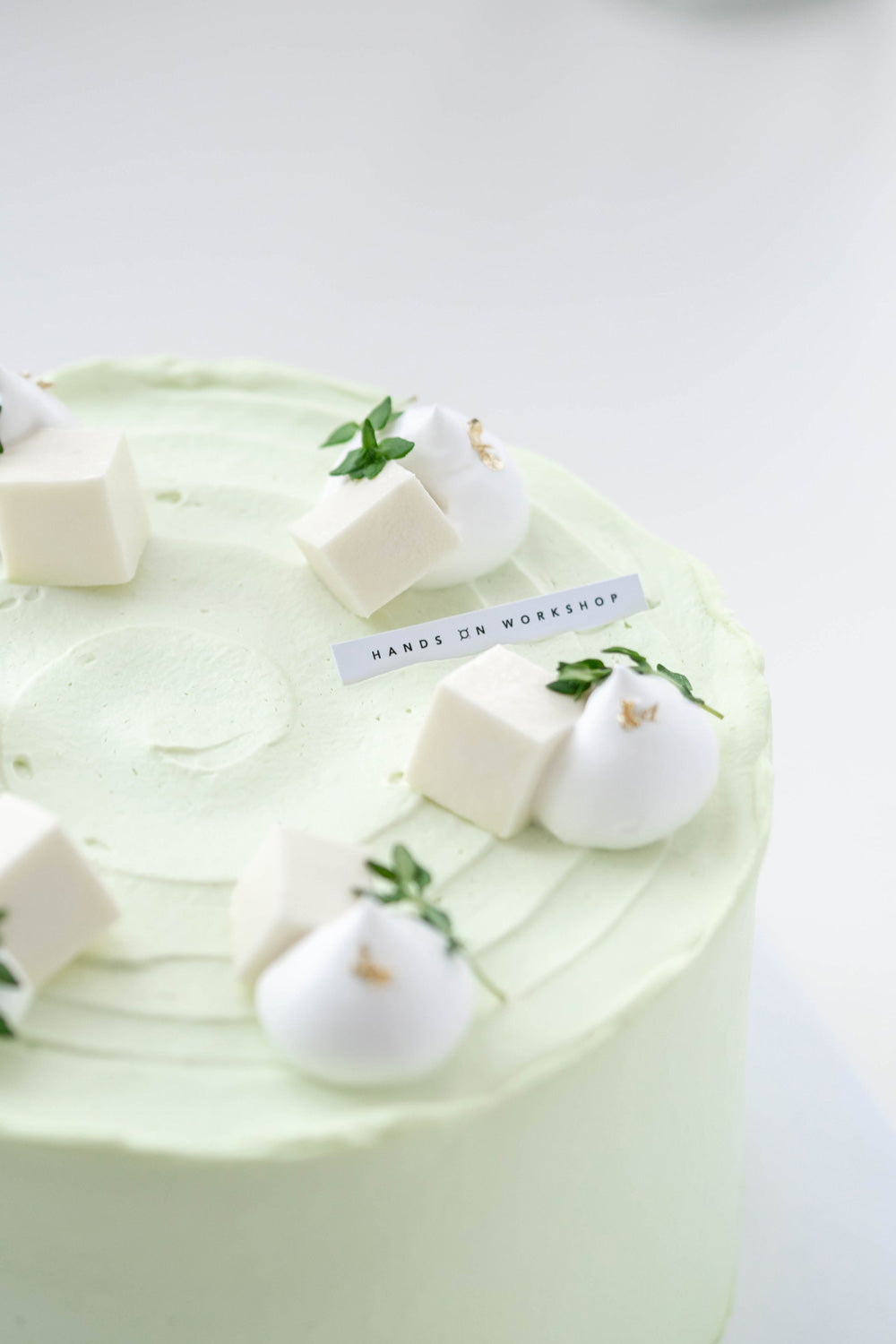 Ondeh Ondeh Cake decorated with  Pandan Whipping Cream & Coconut Jelly Cubes Topping