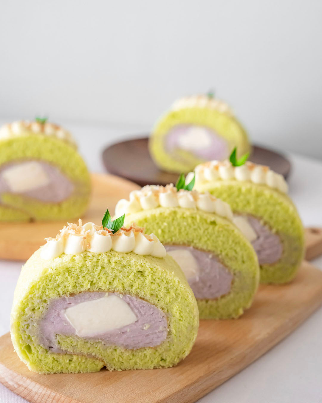 Pandan swiss roll with pure taro filling & coconut jelly